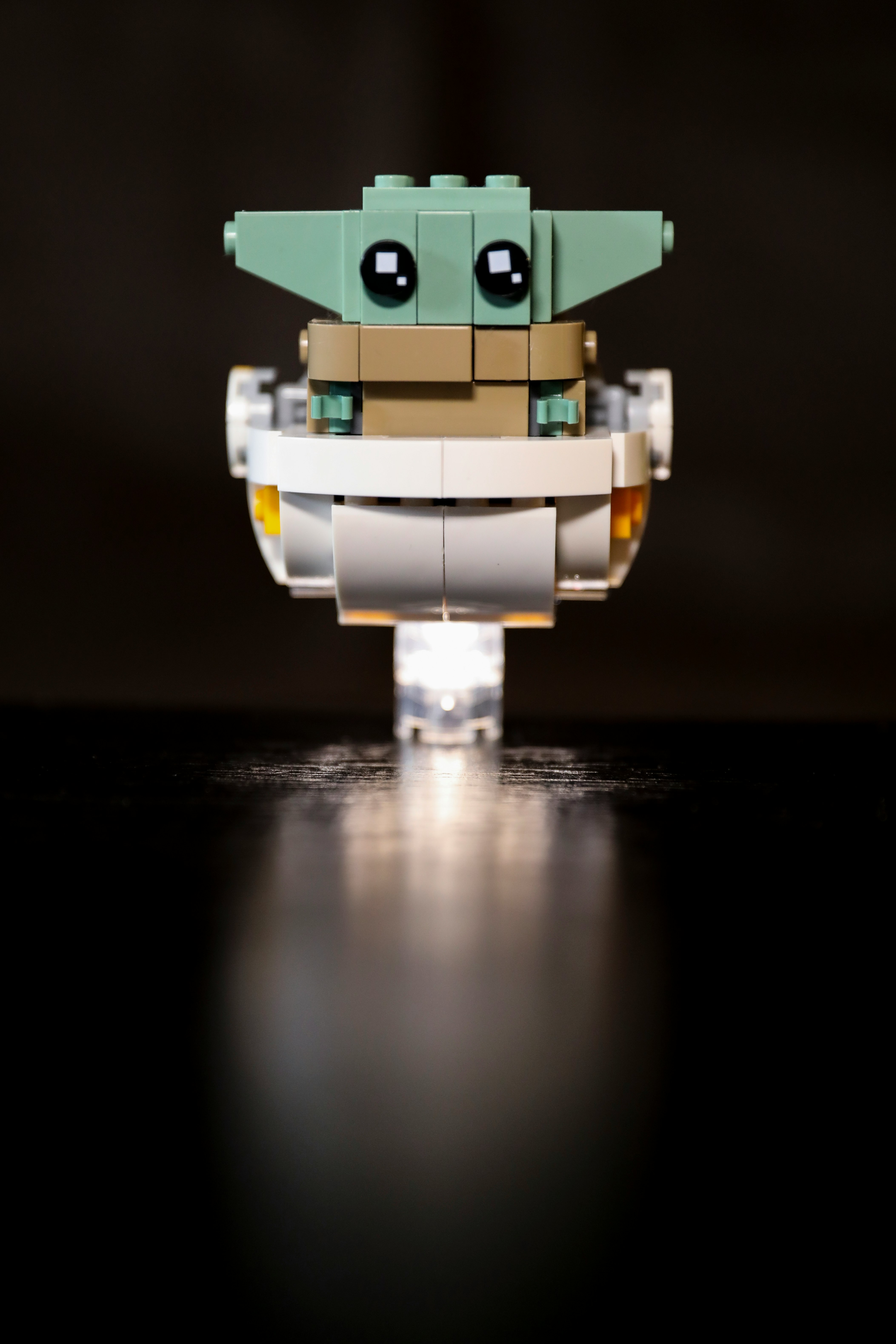 green and white robot toy